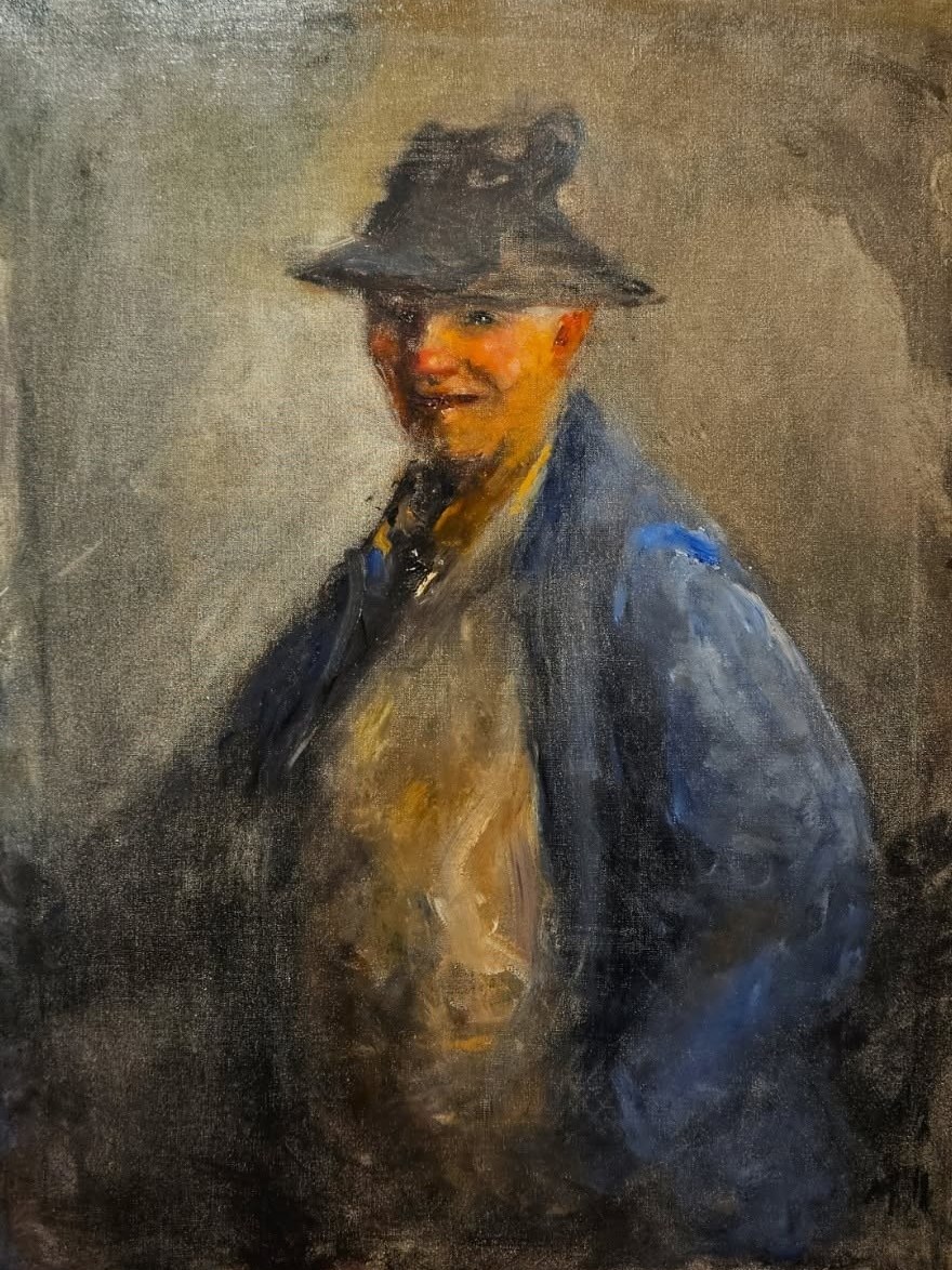 Smiling Man in a Hat and Blue Coat by Henshaw